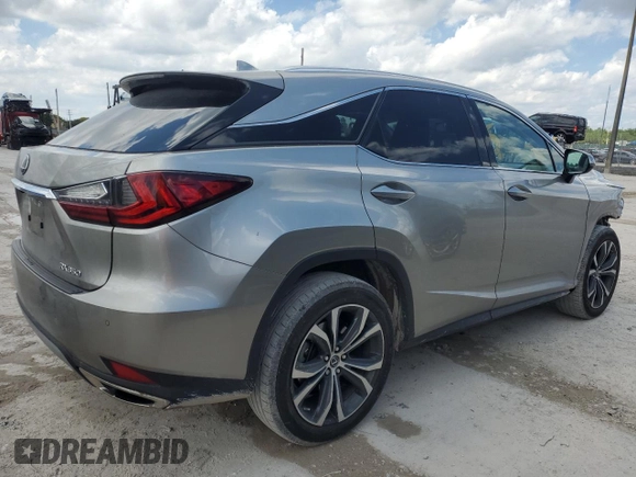 2021 Lexus RX with VIN 2T2HZMAA7MC197389, listed as a Copart auction lot 50637845 with 47,182 mi miles and Salvage Title. Bid and sale history available at carsss.com. Image 3.