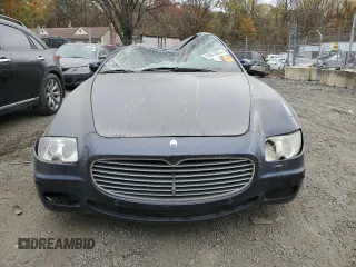 2006 Maserati Quattroporte z VIN ZAMCE39A460025290, wystawiony jako Copart lot #78816054 z przebiegiem Nie podano mil oraz Szkoda całkowita • Salvage title. Historia ofert i sprzedaży dostępna na DreamBid. Obrazek 5.