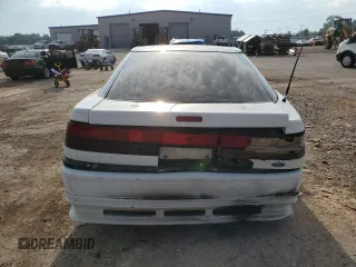 1990 Ford Probe GL z VIN 1ZVPT20CXL5212307, wystawiony jako Copart lot #54941994 z przebiegiem 241 227 mil mil oraz Szkody całkowita. Historia ofert i sprzedaży dostępna na DreamBid. Obrazek 6.