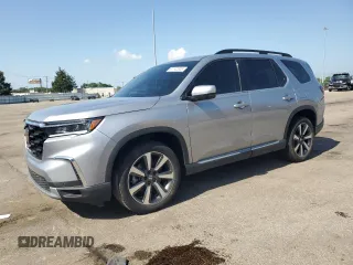 2023 Honda Pilot Touring with VIN 5FNYG1H71PB039231, listed as a Copart auction lot 61742805 with 39,920 mi miles and Salvage title. Bid and sale history available at DreamBid. Image 1.