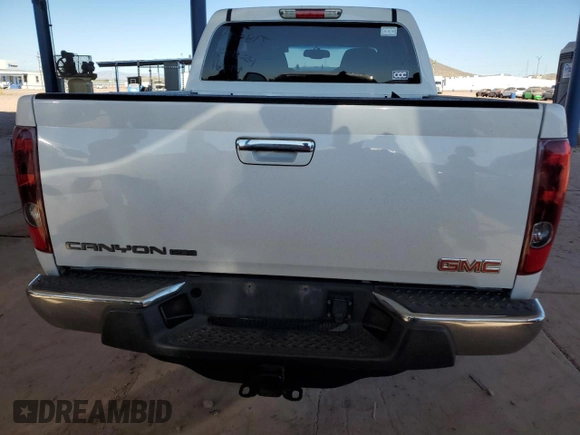 2012 GMC Canyon SLE1 with VIN 1GTH6MFE5C8126517, listed as a Copart auction lot 80672724 with 161,090 mi miles and Salvage Title. Bid and sale history available at carsss.com. Image 6.