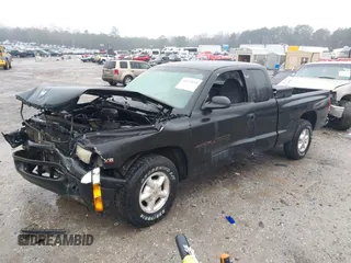 1997 Dodge Dakota with VIN 1B7GL23X2VS209651, listed as a IAAI auction lot 41421859 with 246,016 mi miles. Bid and sale history available at carsss.com. Image 17.