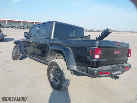 2023 Jeep Gladiator Rubicon with VIN 1C6JJTBGXPL543787, listed as a IAAI auction lot 40963799 with 5,402 mi miles. Bid and sale history available at carsss.com. Image 3.