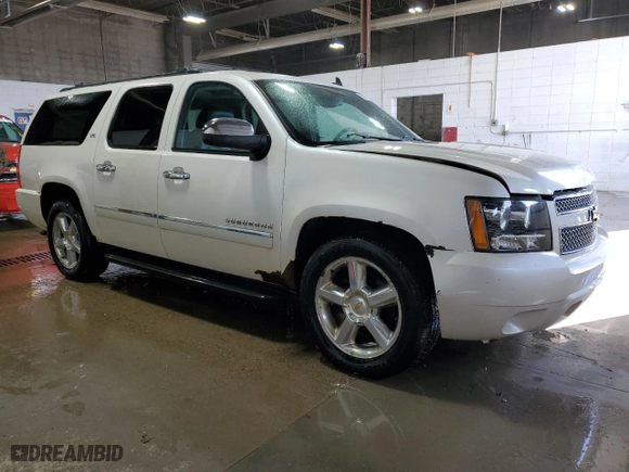 2012 Chevrolet Suburban LTZ with VIN 1GNSKKE74CR325522, listed as a Copart auction lot 52215745 with 214,973 mi miles and Clean Title. Bid and sale history available at carsss.com. Image 4.