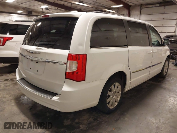 2015 Chrysler Town & Country Touring with VIN 2C4RC1BG9FR626482, listed as a IAAI auction lot 41879865 with 129,694 mi miles and . Bid and sale history available at DreamBid. Image 4.