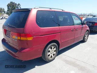 2003 Honda Odyssey EX-L with VIN 5FNRL18963B009184, listed as a IAAI auction lot 42004581 with 125,788 mi miles and . Bid and sale history available at DreamBid. Image 4.