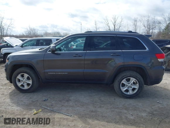 2015 Jeep Grand Cherokee Laredo with VIN 1C4RJFAG6FC140581, listed as a IAAI auction lot 41869952 with 193,295 mi miles. Bid and sale history available at carsss.com. Image 14.
