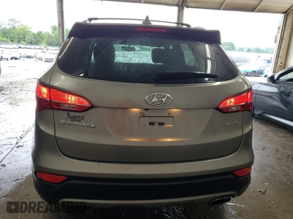 2014 Hyundai Santa Fe with VIN 5XYZU3LB1EG227984, listed as a Copart auction lot 59569905 with 102,477 mi miles and Salvage title. Bid and sale history available at DreamBid. Image 6.