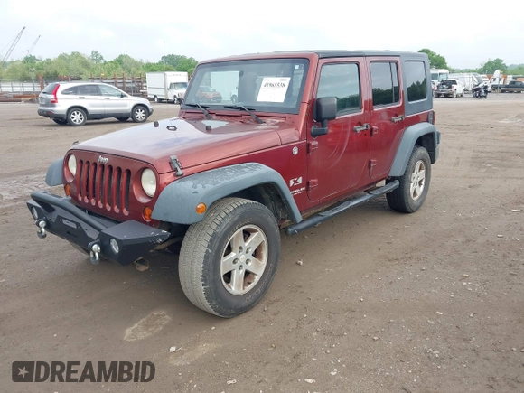 2008 Jeep Wrangler Unlimited X with VIN 1J4GA39108L606685, listed as a IAAI auction lot 41965538 with 288,946 mi miles. Bid and sale history available at carsss.com. Image 17.