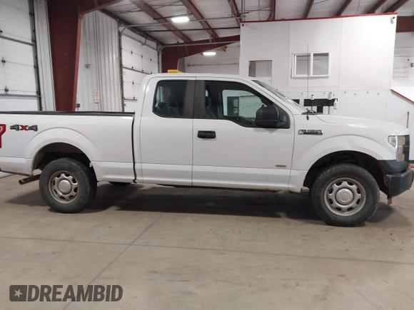 2015 Ford F-150 XLT with VIN 1FTEX1EP6FKE21697, listed as a IAAI auction lot 41960136 with 199,653 mi miles. Bid and sale history available at carsss.com. Image 13.