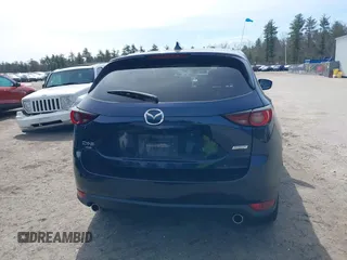 2018 Mazda CX-5 Touring z VIN JM3KFBCM4J0379871, wystawiony jako IAAI lot #41865130 z przebiegiem 48 674 mil mil oraz . Historia ofert i sprzedaży dostępna na DreamBid. Obrazek 17.