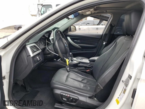 2013 BMW 3 Series 328i with VIN WBA3A5G57DNP23598, listed as a Copart auction lot 55677165 with 217,977 mi miles and Clean Title. Bid and sale history available at DreamBid. Image 7.