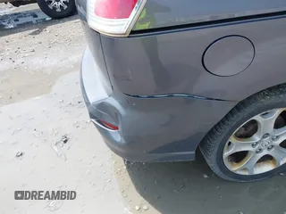 2010 Mazda 5 Sport with VIN JM1CR2W31A0375560, listed as a IAAI auction lot 42618380 with 171,910 mi miles and . Bid and sale history available at DreamBid. Image 13.