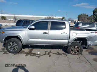 2018 Toyota Tacoma SR with VIN 3TMCZ5AN6JM185891, listed as a IAAI auction lot 41450665 with 53,749 mi miles and . Bid and sale history available at DreamBid. Image 15.