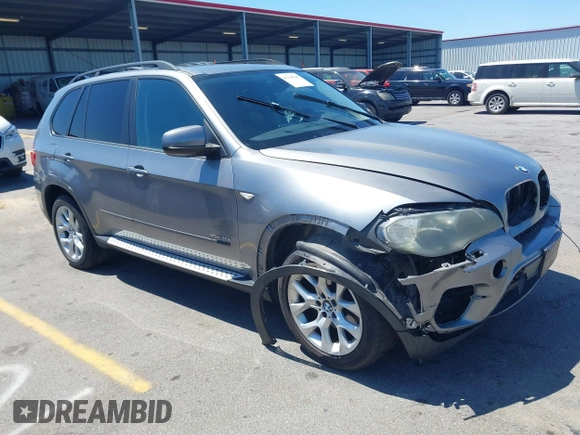 2011 BMW X5 35i z VIN 5UXZV4C57BL410981, wystawiony jako IAAI lot #42126240 z przebiegiem 160 473 mil mil oraz . Historia ofert i sprzedaży dostępna na DreamBid. Obrazek 1.