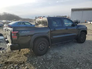 2022 Nissan Frontier Pro-4X z VIN 1N6ED1EK4NN686366, wystawiony jako Copart lot #46265815 z przebiegiem 50 753 mil mil oraz Szkoda całkowita • Salvage title. Historia ofert i sprzedaży dostępna na DreamBid. Obrazek 3.