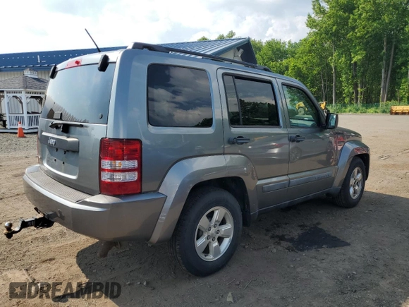 2012 Jeep Liberty Sport z VIN 1C4PJMAK1CW120233, wystawiony jako Copart lot #59922665 z przebiegiem 85 217 mil mil oraz Czysty tytuł • Clean title. Historia ofert i sprzedaży dostępna na DreamBid. Obrazek 3.