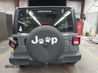 2022 Jeep Wrangler Unlimited Sport with VIN 1C4HJXDG0NW117632, listed as a IAAI auction lot 41185850 with 18,298 mi miles and . Bid and sale history available at DreamBid. Image 16.