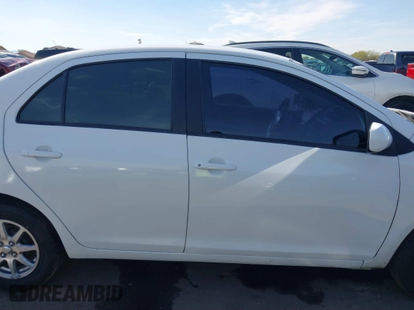 2009 Toyota Yaris z VIN JTDBT903X94060680, wystawiony jako IAAI lot #41590498 z przebiegiem 139 196 mil mil oraz . Historia ofert i sprzedaży dostępna na DreamBid. Obrazek 13.