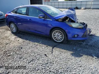 2014 Ford Focus Titanium with VIN 1FADP3J29EL404862, listed as a Copart auction lot 50930435 with 82,728 mi miles and Salvage Title. Bid and sale history available at carsss.com. Image 4.
