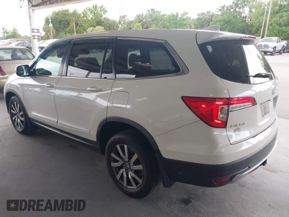 2019 Honda Pilot EX-L with VIN 5FNYF6H57KB011649, listed as a IAAI auction lot 41880951 with 99,504 mi miles. Bid and sale history available at carsss.com. Image 3.