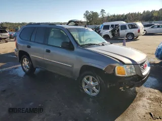 2009 GMC Envoy SLE with VIN 1GKDS33SX92131159, listed as a Copart auction lot 82487404 with 224,391 mi miles and Salvage Title. Bid and sale history available at carsss.com. Image 4.