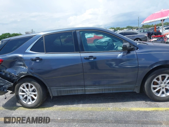 2018 Chevrolet Equinox LT z VIN 3GNAXJEV4JS543119, wystawiony jako IAAI lot #39774801 z przebiegiem 84 747 mil mil oraz . Historia ofert i sprzedaży dostępna na DreamBid. Obrazek 13.