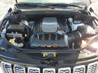 2021 Jeep Grand Cherokee Summit with VIN 1C4RJFJT9MC727660, listed as a Copart auction lot 74756814 with 0 mi miles and Salvage Title. Bid and sale history available at carsss.com. Image 12.