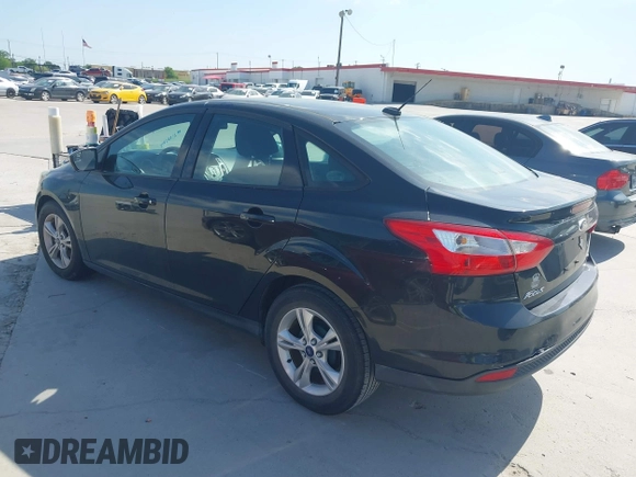 2013 Ford Focus SE with VIN 1FADP3F28DL302475, listed as a IAAI auction lot 42046024 with 110,446 mi miles. Bid and sale history available at carsss.com. Image 3.