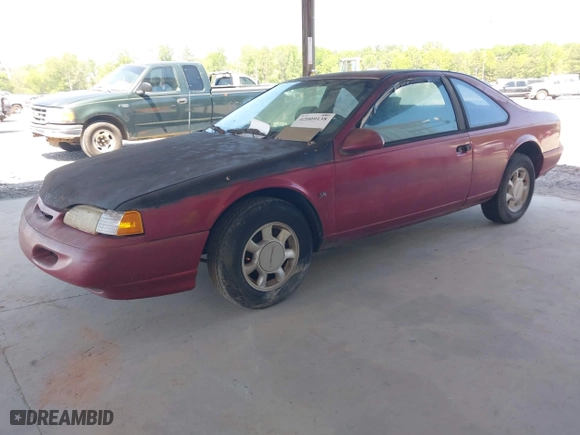 1995 Ford Thunderbird LX with VIN 1FALP62W6SH176090, listed as a IAAI auction lot 42009138 with 114,575 mi miles. Bid and sale history available at carsss.com. Image 2.