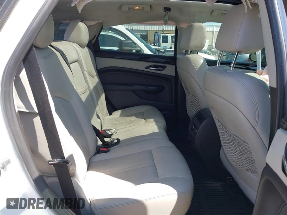 2014 Cadillac SRX Performance Collection with VIN 3GYFNCE38ES675508, listed as a IAAI auction lot 41969292 with 147,534 mi miles and . Bid and sale history available at DreamBid. Image 8.