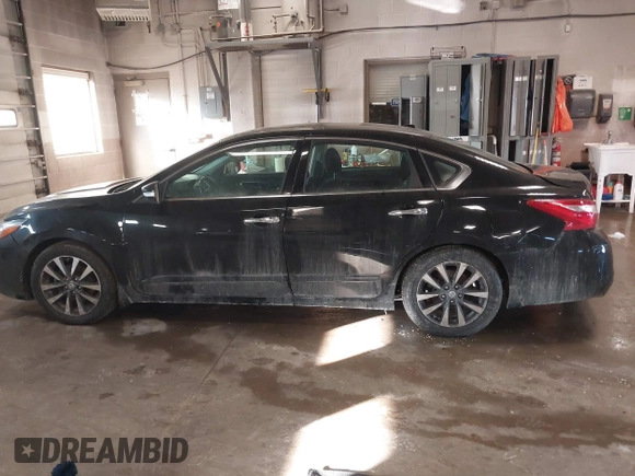 2016 Nissan Altima SV with VIN 1N4AL3AP6GC272379, listed as a IAAI auction lot 41524317 with 104,078 mi miles and . Bid and sale history available at DreamBid. Image 14.