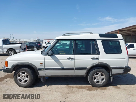 2000 Land Rover Discovery Cloth z VIN SALTY124XYA262828, wystawiony jako IAAI lot #41769729 z przebiegiem 215 711 mil mil oraz . Historia ofert i sprzedaży dostępna na DreamBid. Obrazek 15.