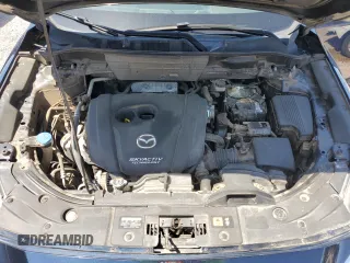 2018 Mazda CX-5 Grand Touring с VIN JM3KFBDM8J0344328, выставлен на аукционе Copart как лот 57665175 с пробегом 131 175 миль миль и Списание • Salvage title. История ставок и продаж доступна на DreamBid. Изображение 12.