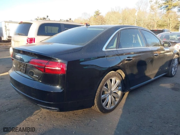 2017 Audi A8 L with VIN WAU44AFD4HN012783, listed as a IAAI auction lot 41303322 with 90,879 mi miles. Bid and sale history available at carsss.com. Image 4.