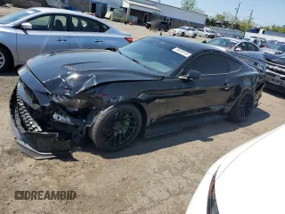 2021 Ford Mustang GT with VIN 1FA6P8CF7M5153039, listed as a Copart auction lot 56058145 with 20,530 mi miles and Salvage title. Bid and sale history available at DreamBid. Image 1.