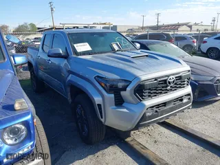 2024 Toyota Tacoma 4WD SR5 with VIN 3TMLB5JN4RM021667, listed as a IAAI auction lot 41343801 with 5,037 mi miles. Bid and sale history available at carsss.com. Image 1.