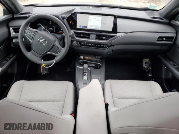 2025 Lexus UX with VIN JTHUCJDH5S2003058, listed as a Copart auction lot 43457505 with 1,239 mi miles and Salvage Title. Bid and sale history available at carsss.com. Image 8.