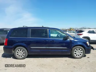 2014 Chrysler Town & Country Touring z VIN 2C4RC1BG0ER444524, wystawiony jako IAAI lot #41861302 z przebiegiem 138 764 mil mil oraz . Historia ofert i sprzedaży dostępna na DreamBid. Obrazek 13.
