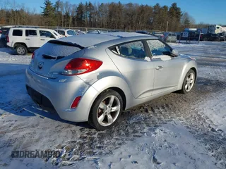 2012 Hyundai Veloster w/Gray Int with VIN KMHTC6AD0CU034568, listed as a IAAI auction lot 41460659 with 141,826 mi miles and . Bid and sale history available at DreamBid. Image 4.