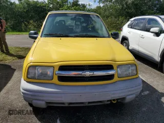 2002 Chevrolet Tracker z VIN 2CNBJ18C326943340, wystawiony jako Copart lot #74628774 z przebiegiem Nie podano mil oraz Szkoda całkowita • Salvage title. Historia ofert i sprzedaży dostępna na DreamBid. Obrazek 5.