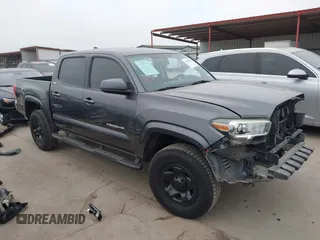 2016 Toyota Tacoma SR5 z VIN 5TFAZ5CN7GX018852, wystawiony jako IAAI lot #41601038 z przebiegiem 205 115 mil mil oraz . Historia ofert i sprzedaży dostępna na DreamBid. Obrazek 1.
