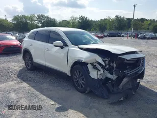 2022 Mazda CX-9 Touring z VIN JM3TCBCY4N0604912, wystawiony jako IAAI lot #42456794 z przebiegiem 49 853 mil mil oraz . Historia ofert i sprzedaży dostępna na DreamBid. Obrazek 1.