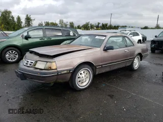 1987 Ford Thunderbird with VIN 1FABP6036HH185658, listed as a Copart auction lot 76998984 with 0 mi miles and Clean Title. Bid and sale history available at carsss.com. Image 1.