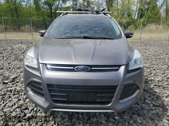 2013 Ford Escape SEL z VIN 1FMCU9HX6DUB05689, wystawiony jako Copart lot #55148765 z przebiegiem 69 178 mil mil oraz Czysty tytuł • Clean title. Historia ofert i sprzedaży dostępna na DreamBid. Obrazek 5.