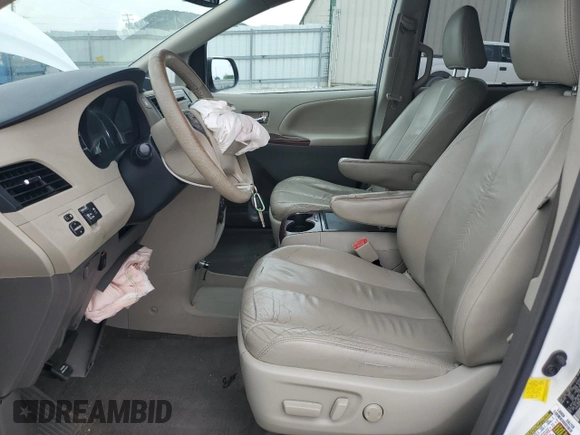 2012 Toyota Sienna XLE AAS с VIN 5TDYK3DC7CS207716, выставлен на аукционе Copart как лот 60592265 с пробегом 287 021 миль миль и Списание • Salvage title. История ставок и продаж доступна на DreamBid. Изображение 7.