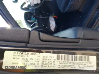2014 Jeep Grand Cherokee Laredo with VIN 1C4RJEAG7EC263590, listed as a IAAI auction lot 41699106 with 136,581 mi miles and . Bid and sale history available at DreamBid. Image 9.