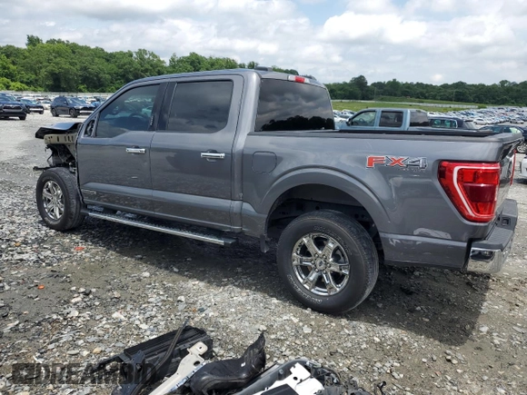 2021 Ford F-150 XL with VIN 1FTFW1EDXMFC91152, listed as a Copart auction lot 58350455 with 59,992 mi miles and Salvage title. Bid and sale history available at DreamBid. Image 2.