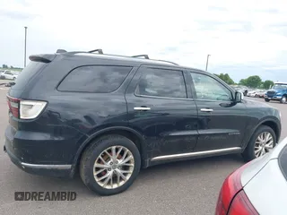 2014 Dodge Durango Citadel with VIN 1C4SDJET5EC314304, listed as a IAAI auction lot 42682540 with 213,651 mi miles and . Bid and sale history available at DreamBid. Image 13.