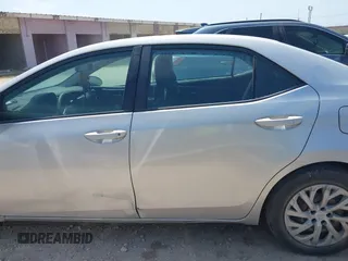 2018 Toyota Corolla L with VIN 2T1BURHE1JC986244, listed as a IAAI auction lot 41942626 with Not provided miles and . Bid and sale history available at DreamBid. Image 14.